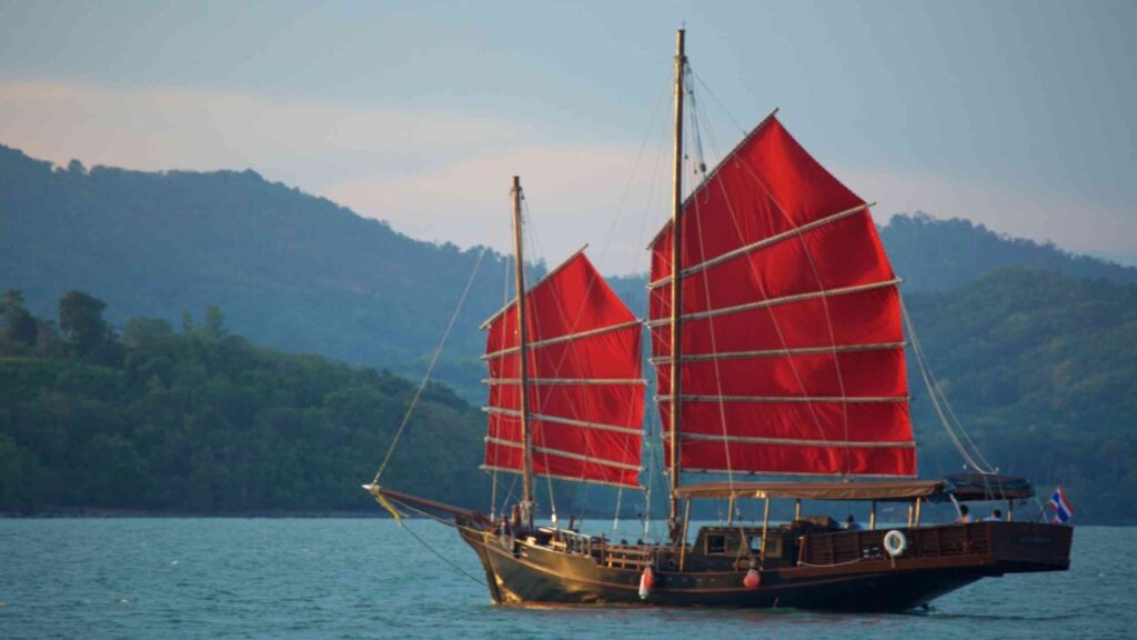 Explore Phang Nga Bay aboard a traditional Chinese junk charter boat